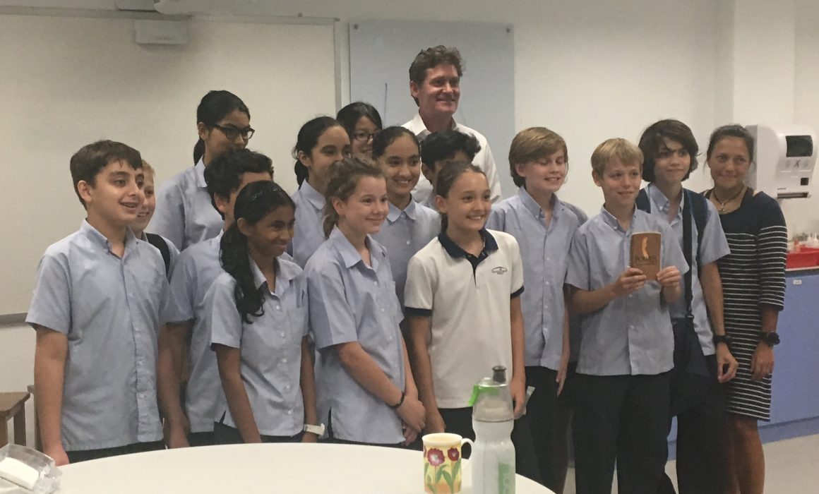 Craig Leeson with students in Singapore
