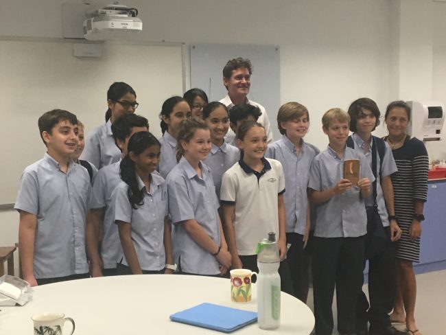 Craig Leeson with students in Singapore