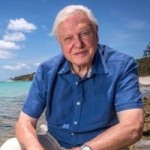 David Attenborough sitting on coast