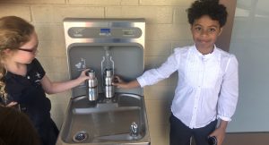 Kids with water refill station