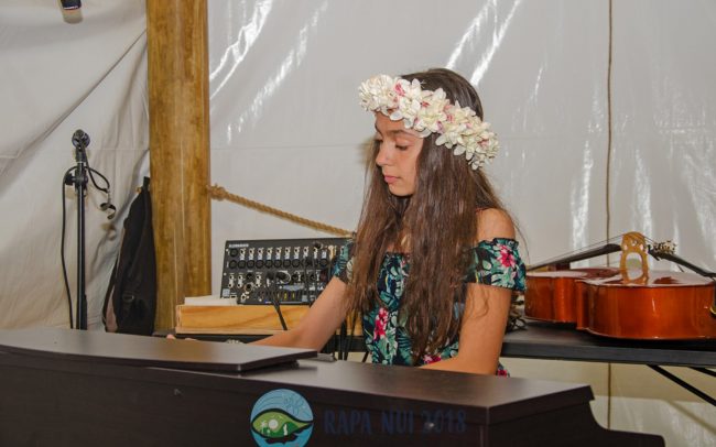 Student Hiva Atan playing the piano.